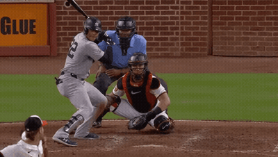 New York Baseball Player Swinging At Pitch GIF