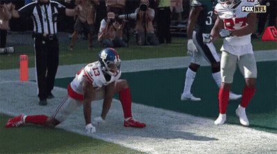 New York Giants Football Player Kneeling GIF