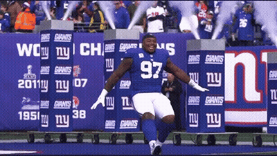 New York Giants Player Number 97 Running On Field GIF