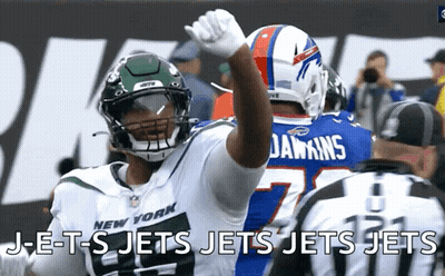 New York Jets High Fiving Buffalo Bills Player GIF