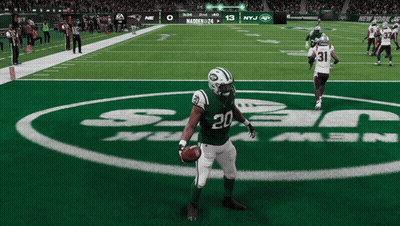 New York Jets Player Holding Football