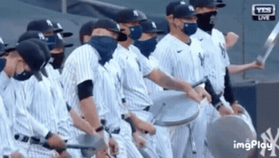 New York Yankees Baseball Players Wearing Masks Holding Bats GIF