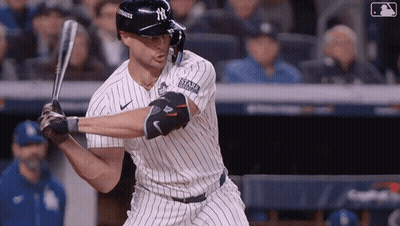 New York Yankees Player Swinging At Pitch GIF