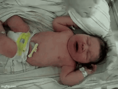 Newborn Baby Crying On Bed GIF