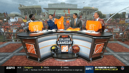 News Casters Holding Up Rocky Top Jersey GIF