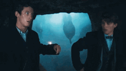 Newt Scamander Dodging Octopus Tentacles GIF