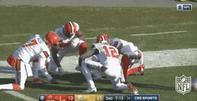 NFL Players Kneeling On Field GIF
