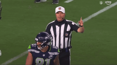 NFL Referee Pointing At Football Player Number 11 GIF