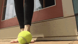 Nice Foot Massage Using Golf Ball GIF
