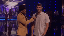 Nick Cannon Interviewing Michael Phelps GIF