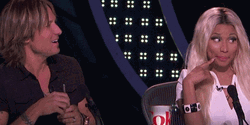 Nicki Minaj Playing Innocent GIF