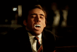 Nicolas Cage Fake Vampire Teeth GIF
