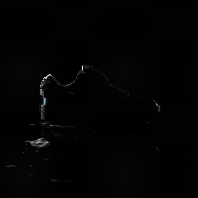 Nike Black And White Shoe With Blue Swoosh GIF
