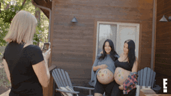 Nikki Bella Painted Pregnant Belly GIF