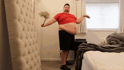 Nikocado Avocado Holding A Feather Duster GIF
