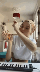 Nina Nesbitt Playing Smallest Violin GIF