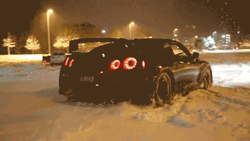 Nissan Skyline R34 Speeding Up Snowy Road GIF