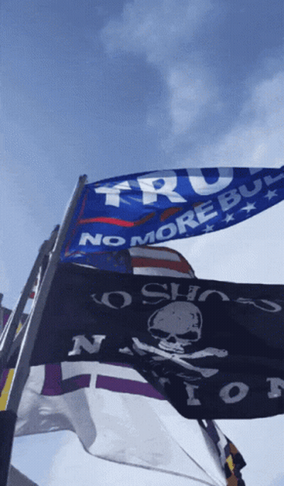 No More Bull Flags Flying In Wind GIF