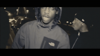 North Face Jacket Man Beside Black Hat Man GIF
