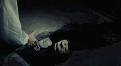 Nosferatu Lying Down Removing The Rock GIF