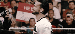 Not Impressed CM Punk Smirking  GIF