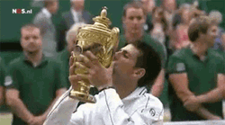 Novak Djokovic Kissing A Trophy GIF