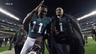 Number 11 Jersey Player Next To Number 1 Jersey Man GIF