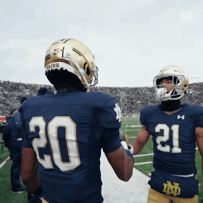 Number 8 Baseball Player Talking To Another GIF