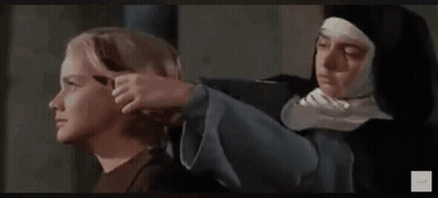 Nun Standing Next To Young Boy In Movie GIF
