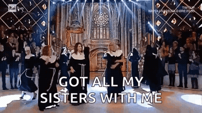 Nuns Dancing On Stage As Crowd Watches GIF