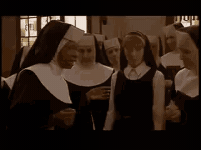 Nuns Standing In Church GIF