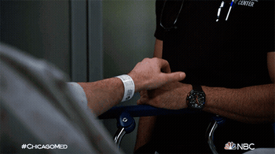 Nurse Holding Patient Hand NBC Chicagomed Ad GIF
