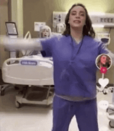 Nurse Holding Patient Picture GIF