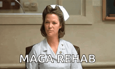 Nurse Sitting In Chair With MAGA Rehab Screen GIF