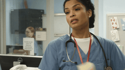 Nurse With Stethoscope In Front Of Dell Monitor GIF