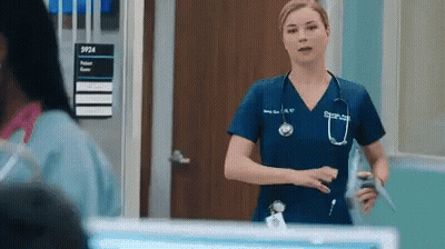Nurse With Stethoscope In Front Of Sign 5924 GIF