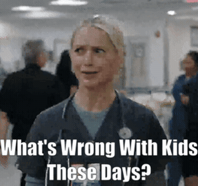 Nurse With Stethoscope In Hospital Hallway GIF