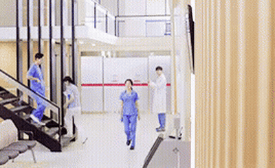 Nurses Walking Down Hospital Stairs GIF
