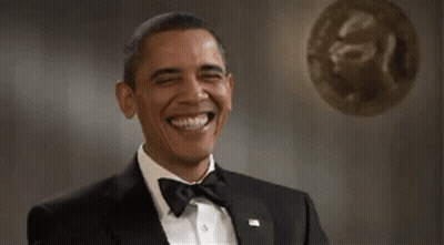 Obama In Tuxedo And Bow Tie Laughing GIF