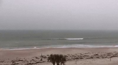 Ocean View From Beach On Cloudy Day GIF