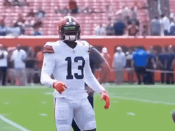 Odell Beckham Jr Points Upward Then Strangle Pose GIF