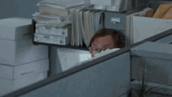 Office Space Milton Hiding With Phone On GIF