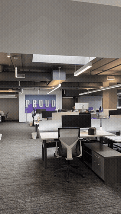 Office With Sign Saying Proud GIF
