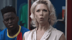 Ohhh Rebecca Welton And Guy Behind Her GIF | GIFDB.com