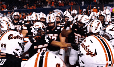 Oklahoma State Football Players Huddle Up GIF