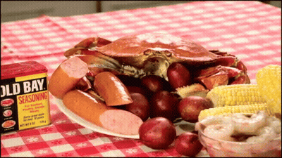 Old Bay Seasoning Box Next To Plate Of Food GIF