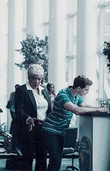 Old Cougar Dancing Behind Young Man GIF