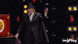 Old Magician Doing Trick In A Show GIF