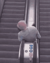 Old Man In Escalator