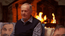 Old Man Near Fireplace Gun To Head GIF